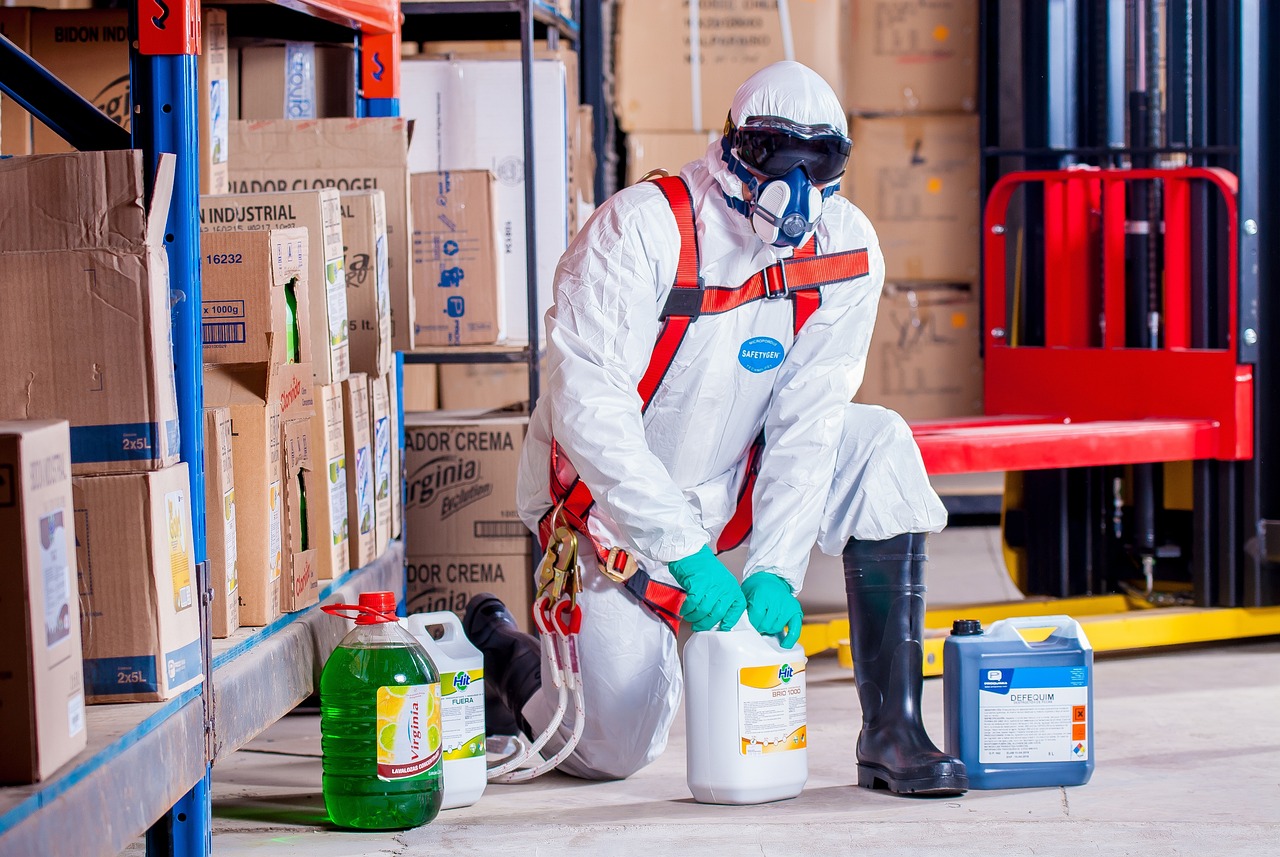 Control of Substances Hazardous to Health (CoSHH) - Man in Hazmat suit working with chemicals